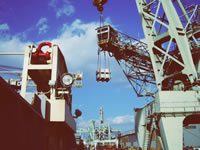 Cargo loading at a quay adjacent to a Steel Mill