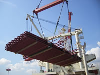 Loading general cargoes onto a conventional cargo vessel